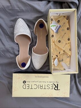 Restricted White Flats w/ silver embellishments